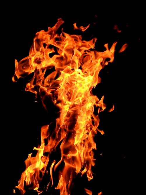 home grill flame on a black background